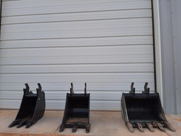 Excavator buckets, trenchers, tractors, skid steers, loaders, auger, trailer, heavy equipment rental