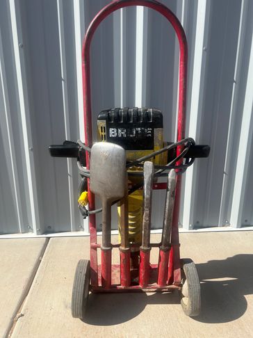 Jack hammer with cart and bits, concrete saw, auger, pallet jacks, tilt deck trailer, drop deck