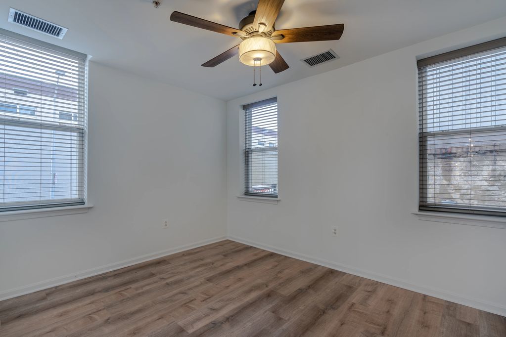 Lots of natural light in the bedroom while maintaining privacy due to the height of the windows