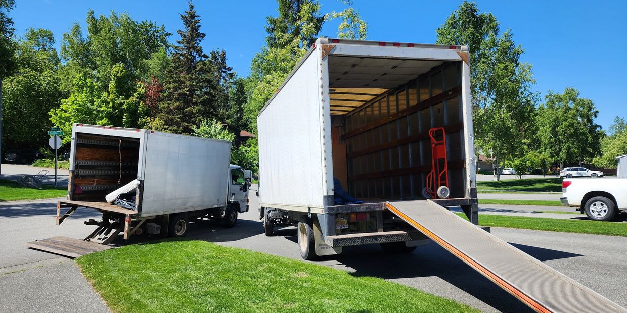 We come ready to work! One truck is for junk, the other- valued items to be moved to a new location.