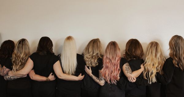 Back of women to show off their hair