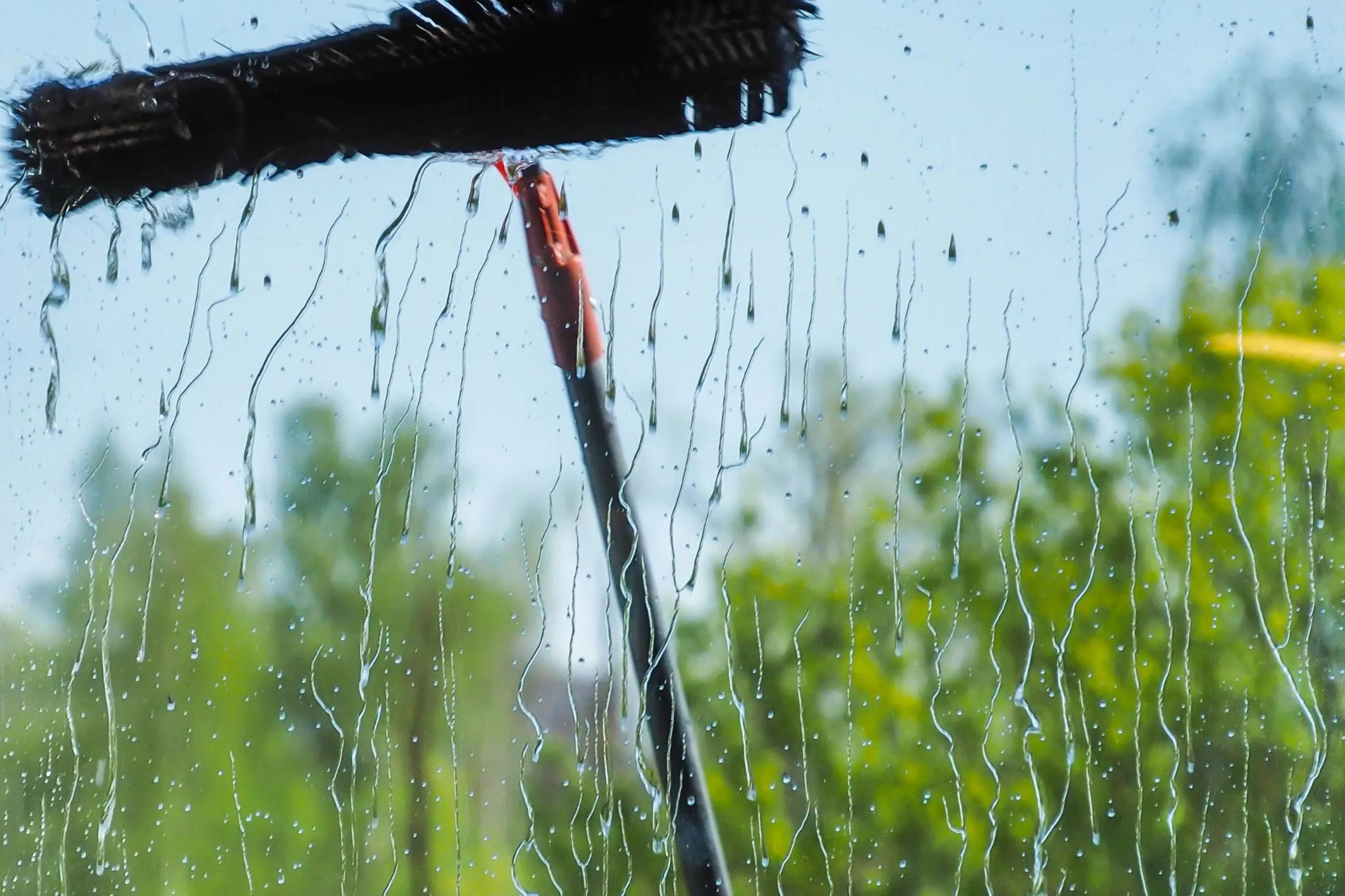 window cleaning with a brush