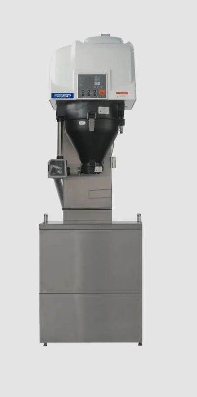 Industrial machine with control panel and large hopper on metallic base.