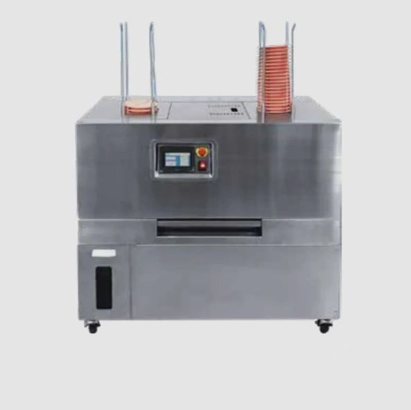 Industrial stainless steel machine with control panel and stacked plates.