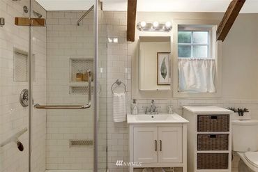 Classic, yet functional design for the guest house. Notice the nook in the shower?  That's for shavi