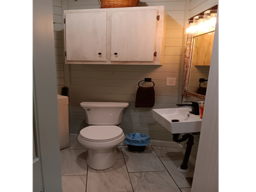 Queen Bedroom 1 has a convenient 1/2 bathroom.