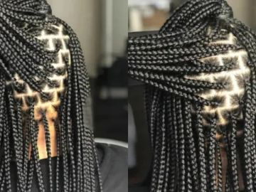 Intricate braided hairstyle with detailed patterns.