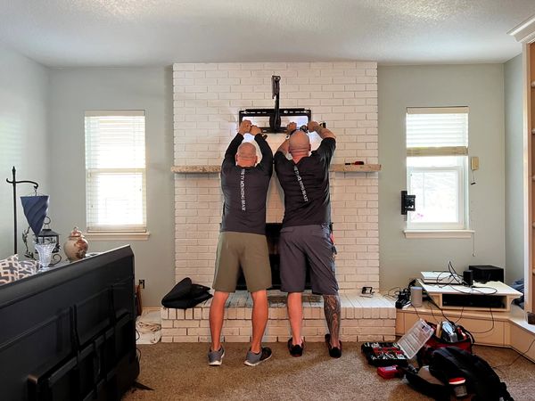 Installing a TV above a fireplace on a MantleMount