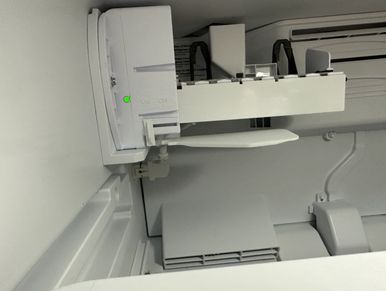 Freezer ice maker on/off switch checked during a home watch inspection.