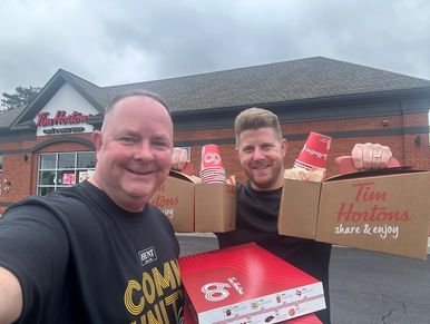 Dan Powell buying Tim Hortons coffee for the group of volunteers.