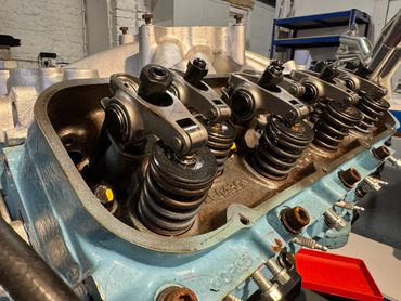 Comp Cams 1.7:1 stainless roller rockers on a 496ci big block chevy engine with World Products heads.
