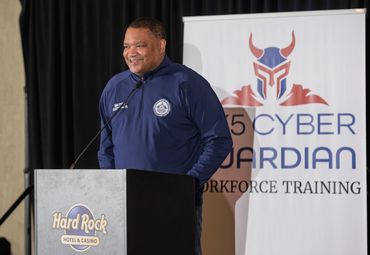 Speaker presenting on stage at an event