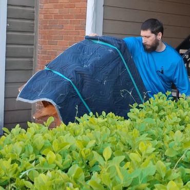 Mover watching carefully as they move item