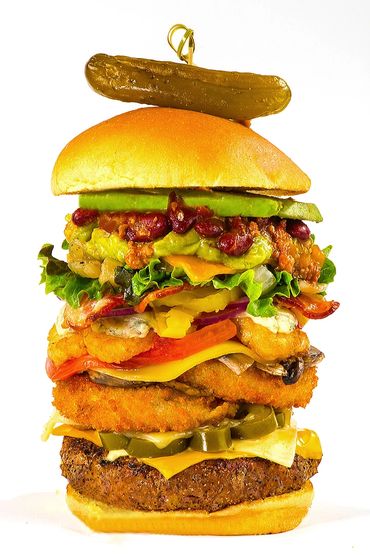 an everything burger, food photography of hamburger 