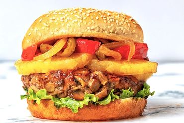 Burger,Mushrooms,Pork,Pinapple,Red Pepper,Sauted Onion,Sweet&Sour Sauce,Seeded Burger Bun