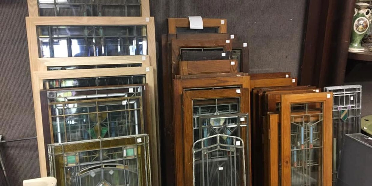 Reclaimed windows for sale at Dell’s Architectural Antiques in Eau Claire, Wisconsin.