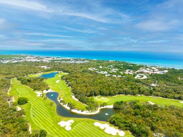 Picturesque golf course view at Gran Coyote Golf Course, Corasol, highlighting the lush fairways