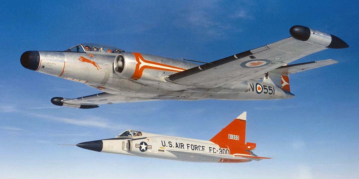 Avro CF-100 Canuck Mk.5 of 410 Squadron accompanied by Convair F-102A. (CF Photo)