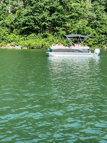 Group of people traveling in a boat in river