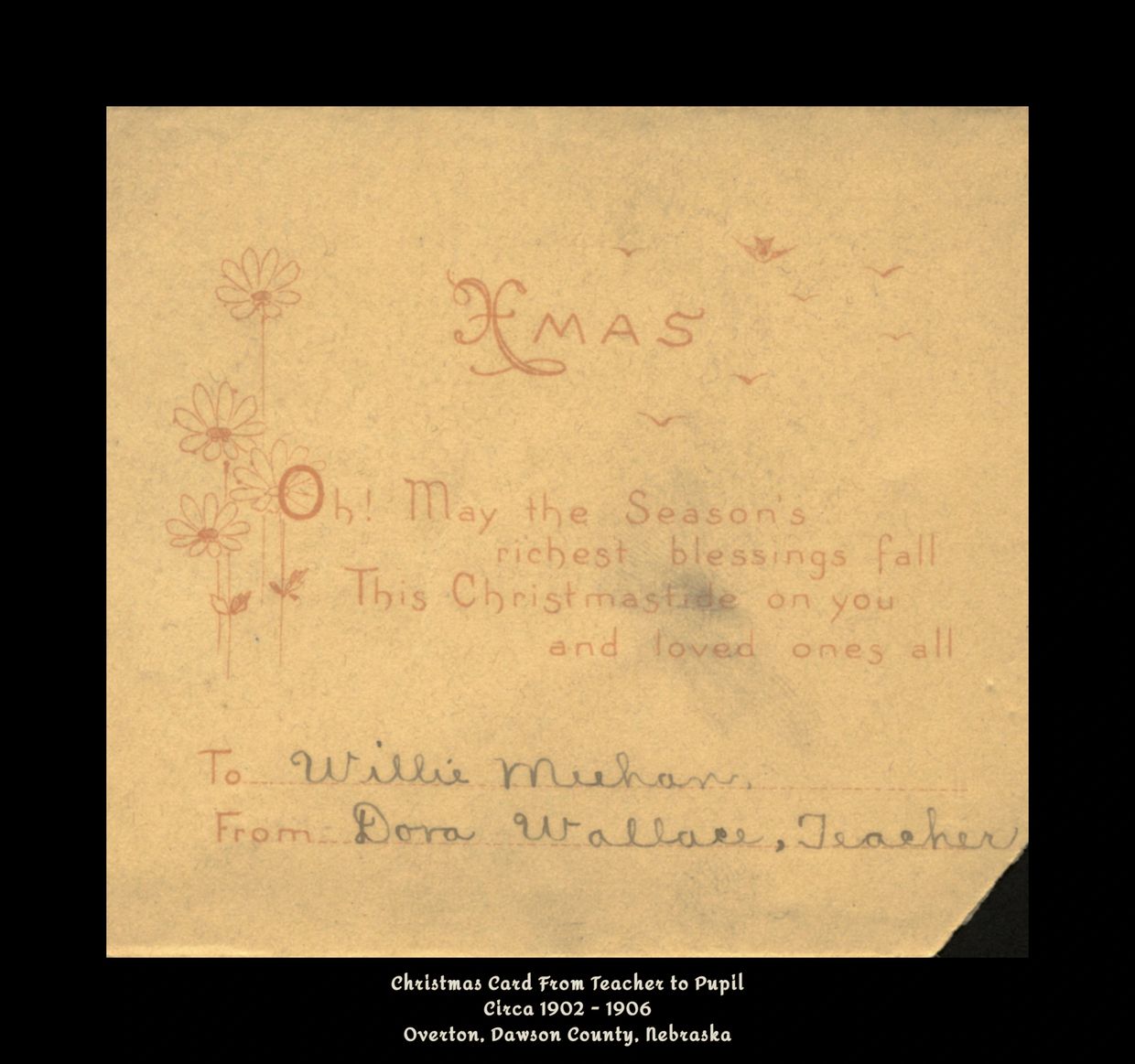 Vintage Christmas card from early 1900s with handwritten note from teacher to pupil.