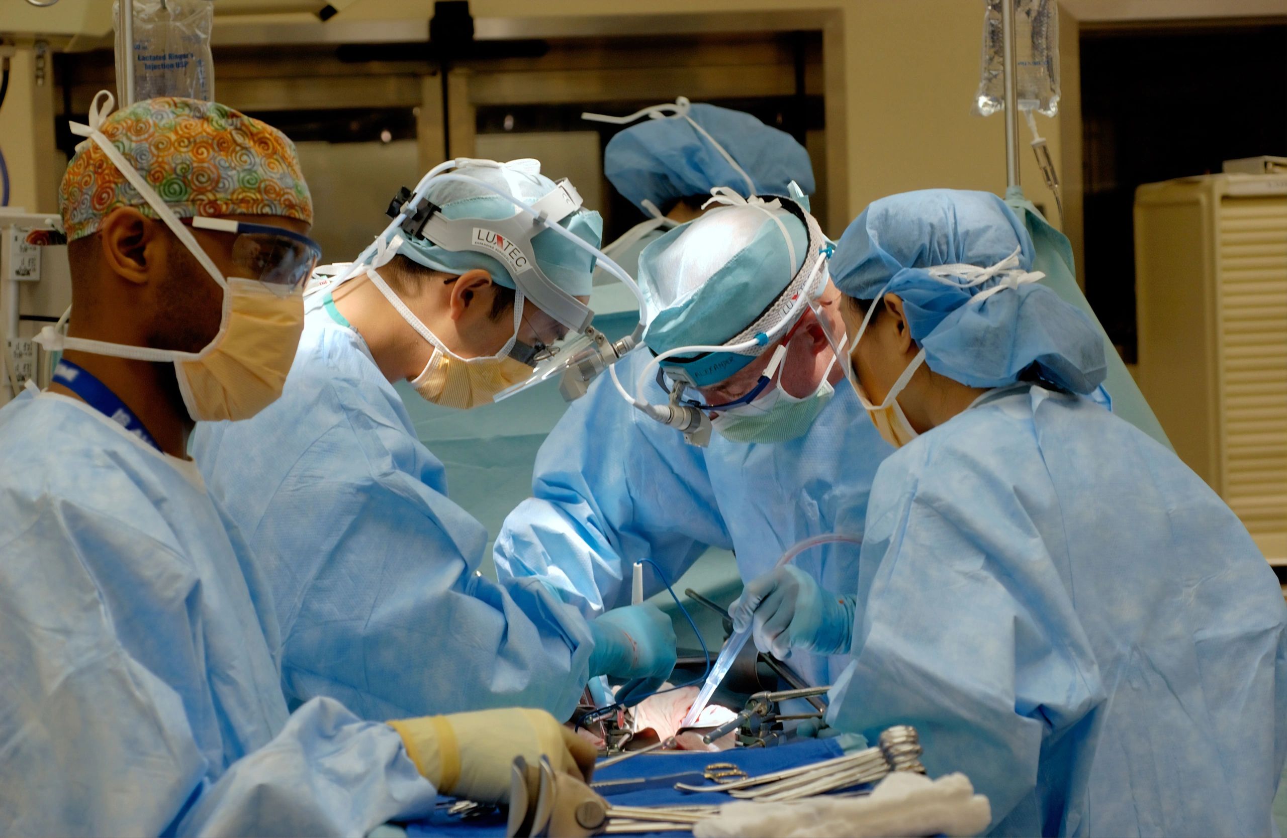 Medical professionals preforming surgery