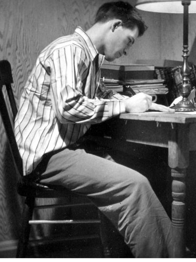 A young Walter Evans captured in a pose familiar to those who knew him: engaged, intense, and enjoyi