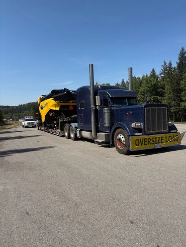 A Combine loaded in Tacoma Washington that was picked up at Kingsgate B.C. taken to Alberta and B.C.