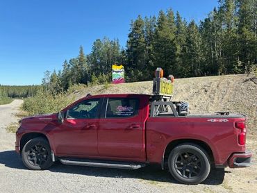 Cathy Laitinen on the way to NWT with a atco building on a DBI Transport