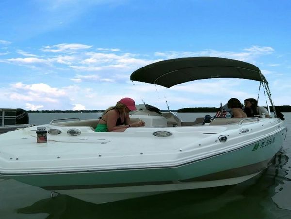 Guests relaxing on Salt Therapy charter boat during a private sandbar cruise in Clearwater