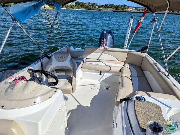 Interior seating and helm of Salt Therapy charter boat for private cruises in Clearwater Florida
