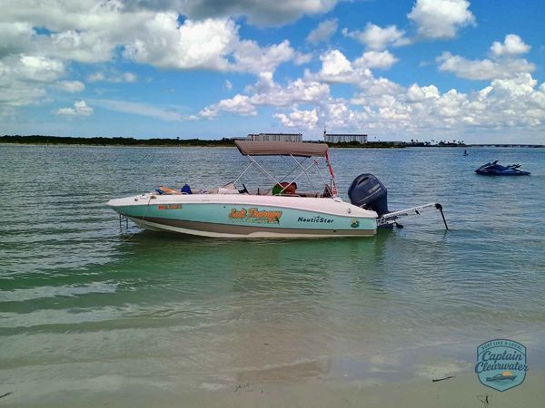 Salt Therapy charter boat anchored at a sandbar during a private boat tour in Clearwater Florida