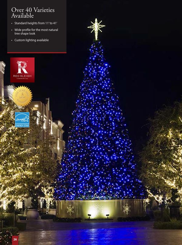 30' high Christmas tree in common area  lit in company branded color blue led lights