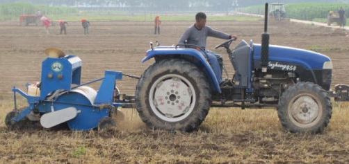 Chinese made Happy Seeder planting wheat into rice residue in Ningxia province.