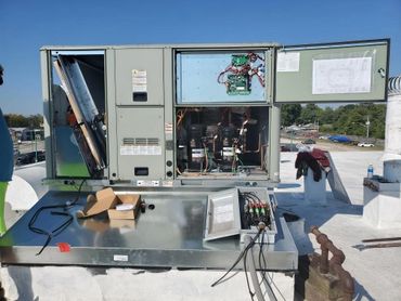 Working on new roof unit