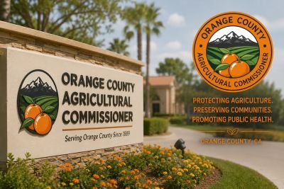 Sign for Orange County Agricultural Commissioner office.