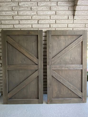 Custom made barn doors stained in a medium brown.