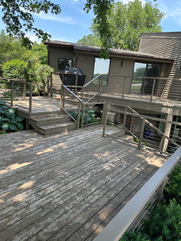 One of many decks before full strip, brightening and stain.