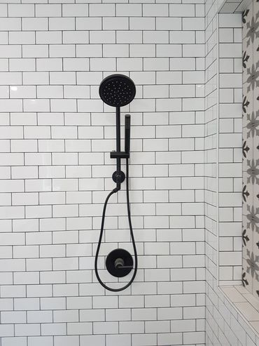 custom shower with hand shower