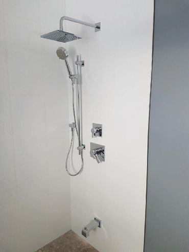 custom shower with hand shower