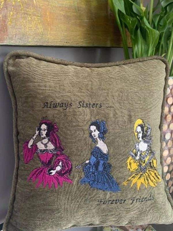 three sister embroidered pillow