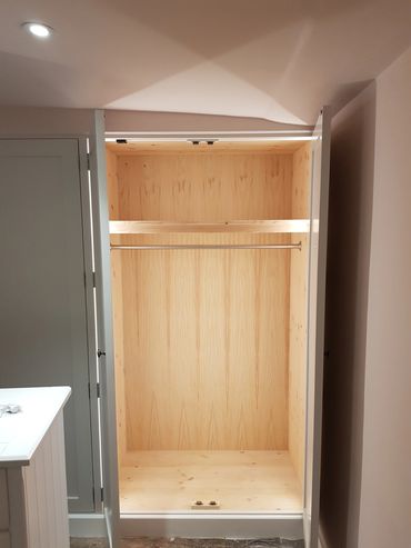 LED lighting installed in a wardrobe on a pressure catch.