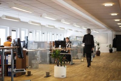 People working in an open plan office