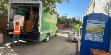 Green Source Junk Removal donating items at Goodwill.
