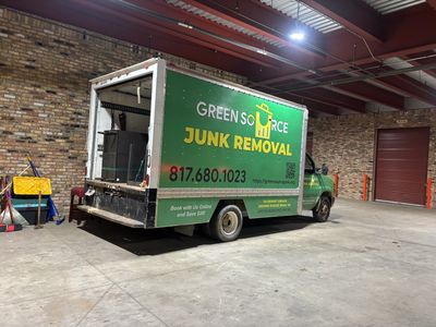 Picture of company truck inside a storage unit facility.