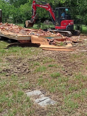 tearing down mobile home trailer