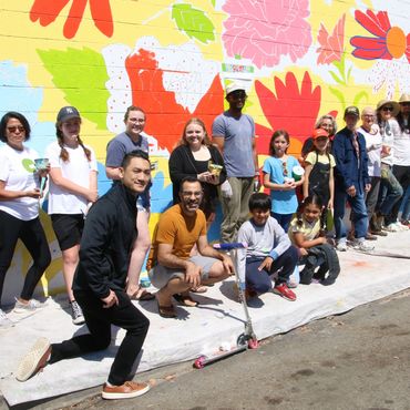 People painting a mural in San Diego