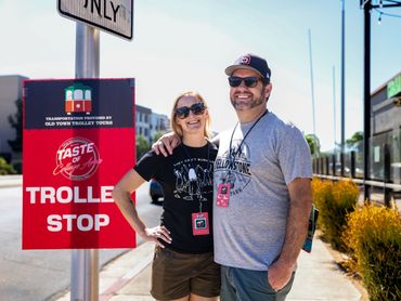 Taste of College Area participants waiting for trolley