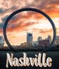 Overlooking the city of Nashville, Tennessee iant aesthetic ferris wheel taking up width of picture