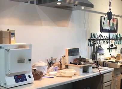 The soldering and fusing area inside the studio.