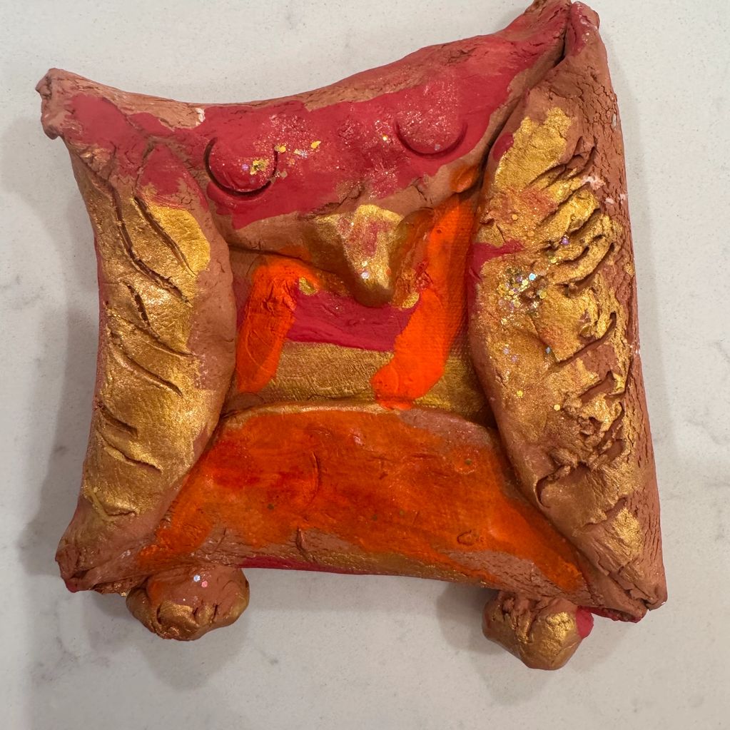 This Beautiful Clay sculpture, sized 4 inches by 4 inches, was made by Asher at just six years old.